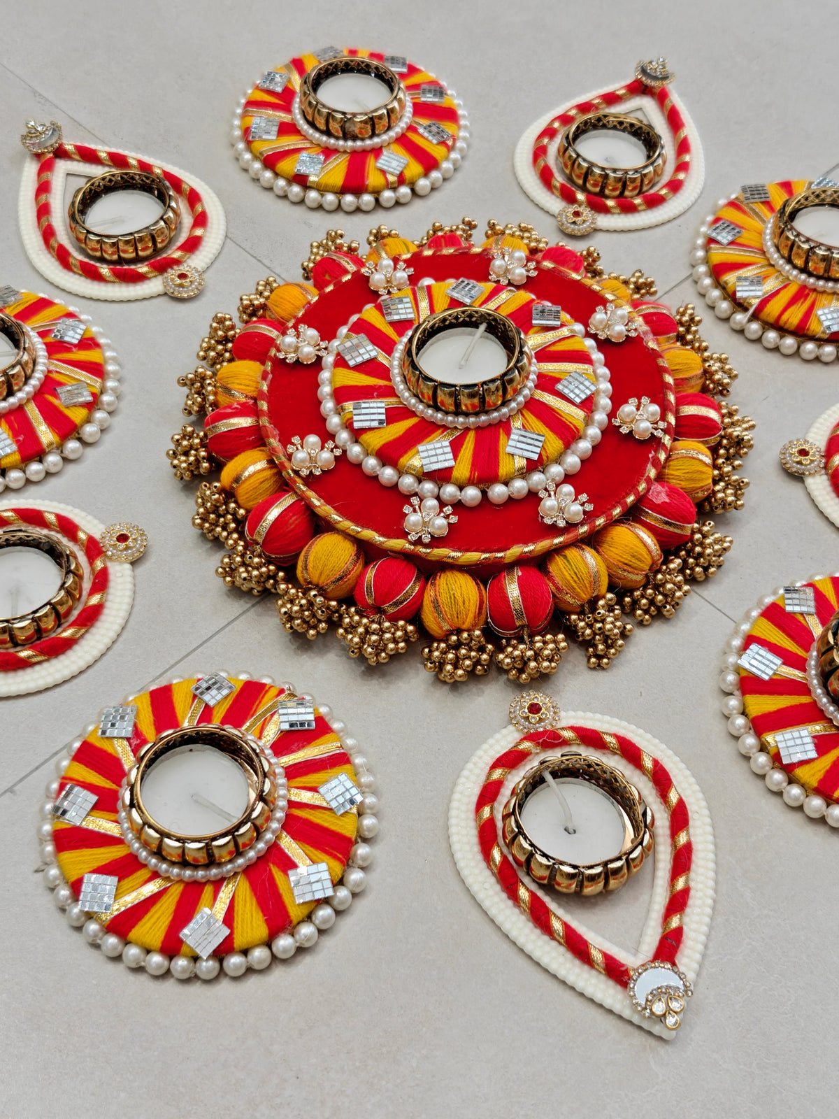 Red & Yellow Pom-Pom Border Rangoli Set with Teardrop Tealight Holders