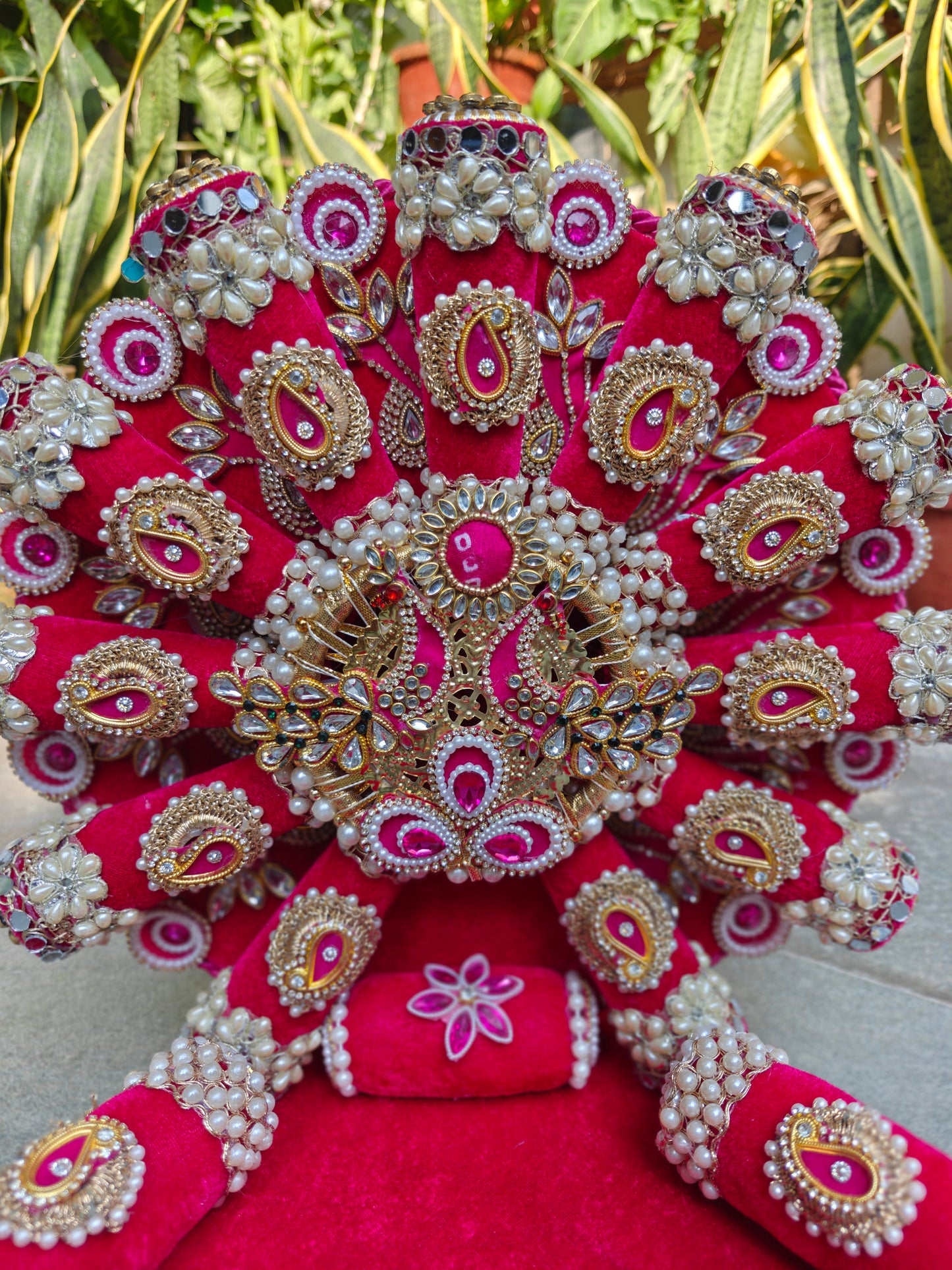 Royal Collection handcrafted rani pink velvet singhasan for Ladoo Gopal – antique gold Kundan polki centrepiece with fuchsia cabochon, zardozi paisley embellishments, mirror roundels, marquise crystals, double pearl border and detachable backdrop – The Wedding Station