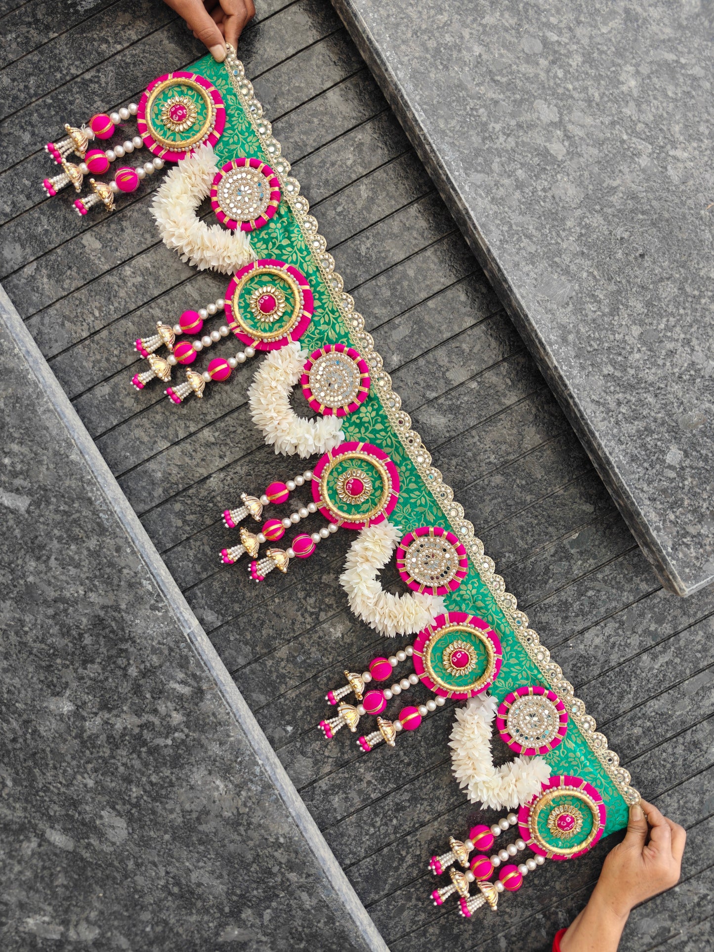 Green brocade Bandhanwar with pink kundan medallions