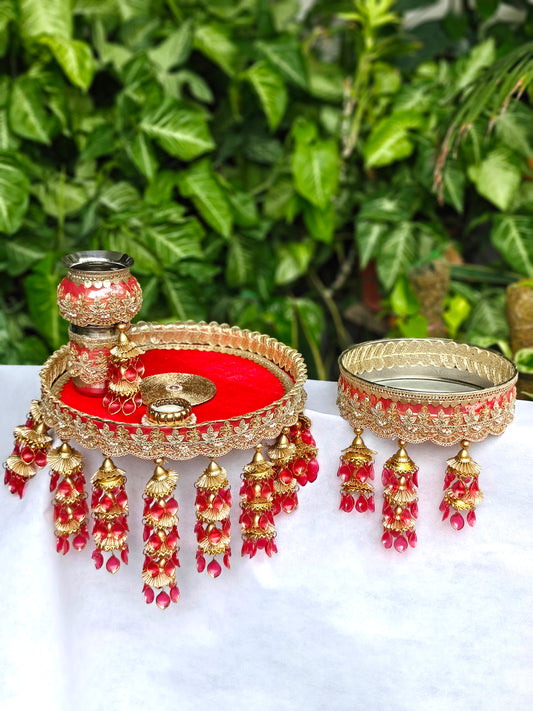Royal red and gold Karva Chauth thali set with decorated steel thali, steel kalash, glass, candle, channi and red hanging latkans