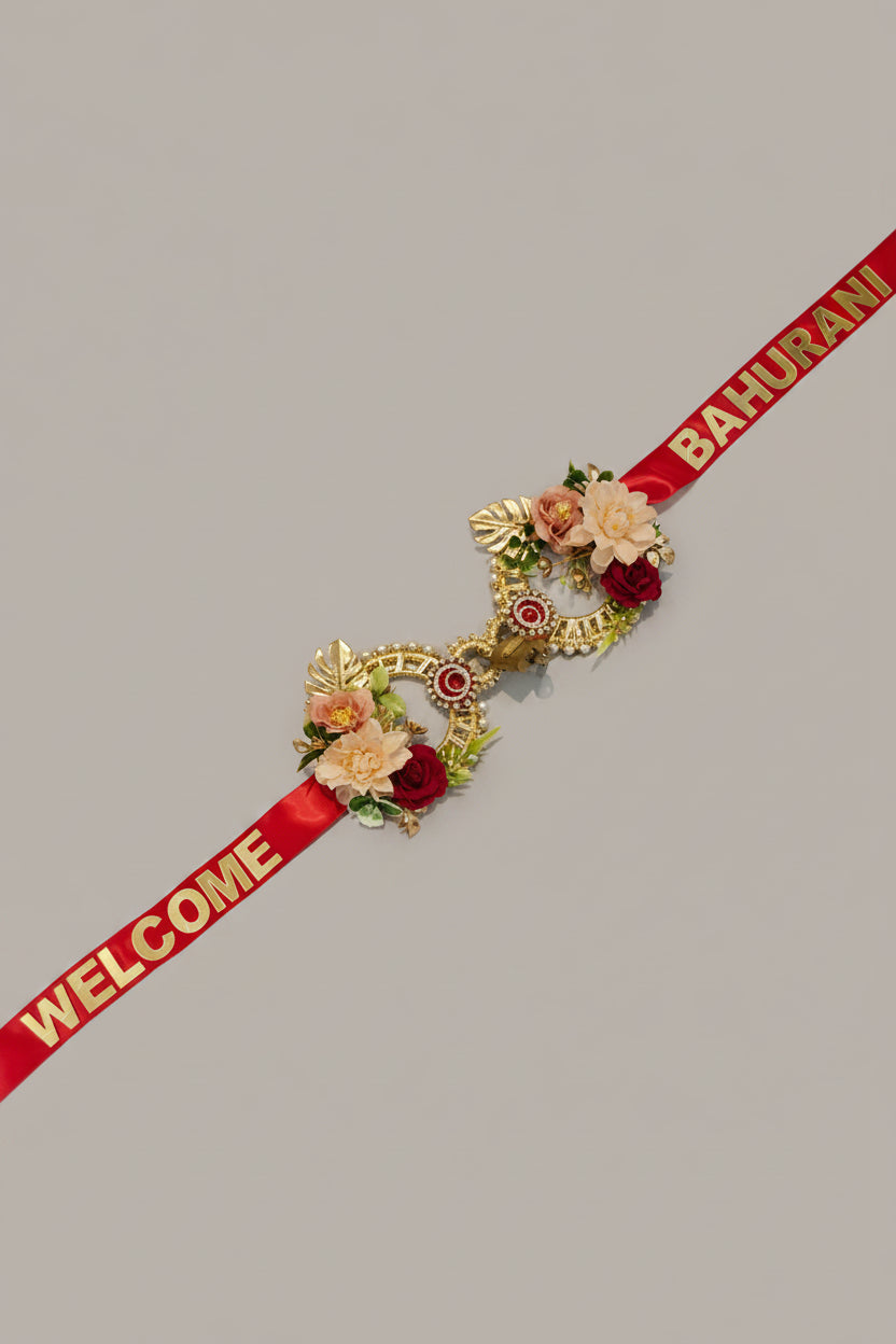 Welcome Bahurani red satin ribbon with gold floral lock decoration for bride's Griha Pravesh entry ceremony