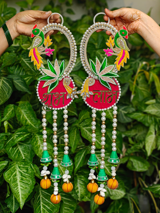 Handcrafted Shubh Laabh Diwali hanging with peacock and lotus motifs, pearl detailing and green tassels, 22.5 x 5.5 inches