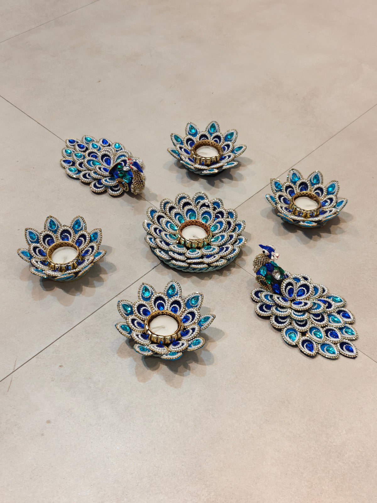 Blue peacock and lotus crystal tealight holder set with kundan and bead work