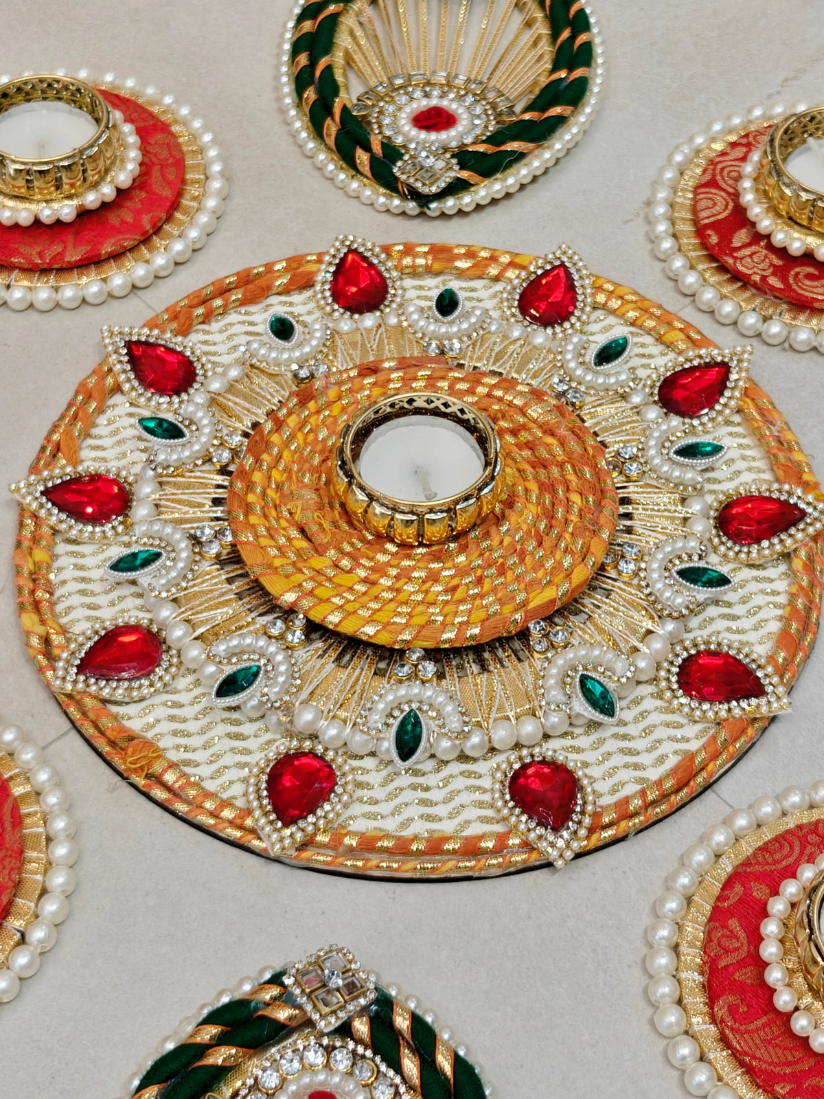 Ivory & Red Floral Rangoli Set with Rose Motifs and Tealight Holders