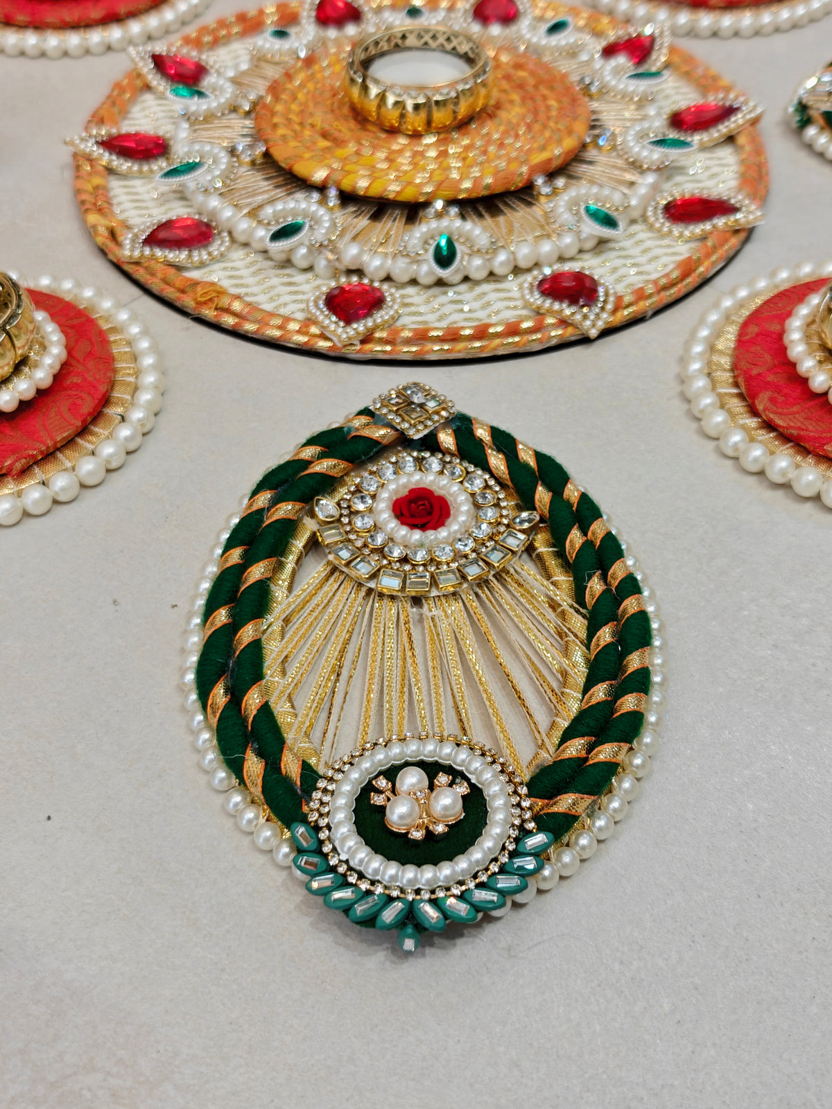 Ivory & Red Floral Rangoli Set with Rose Motifs and Tealight Holders