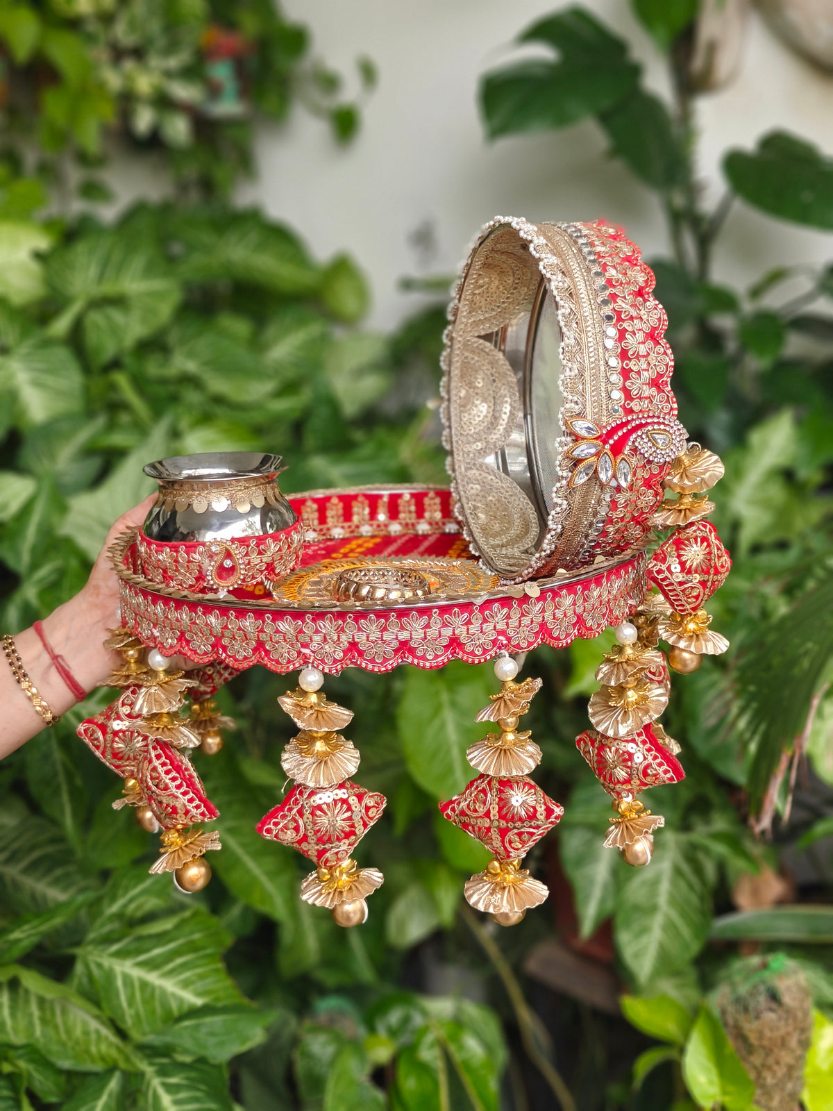 Crimson red Karvachauth thali and chalni set with kundan stonework and gold embroidery