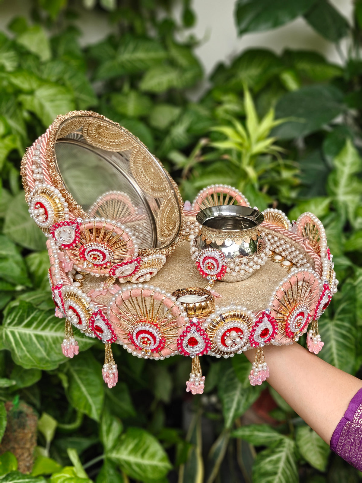 Blush pink designer Karva Chauth thali set with decorated 12-inch steel thali, ornate steel kalash, traditional channi, candle, pearl embellishments and pink hanging latkans