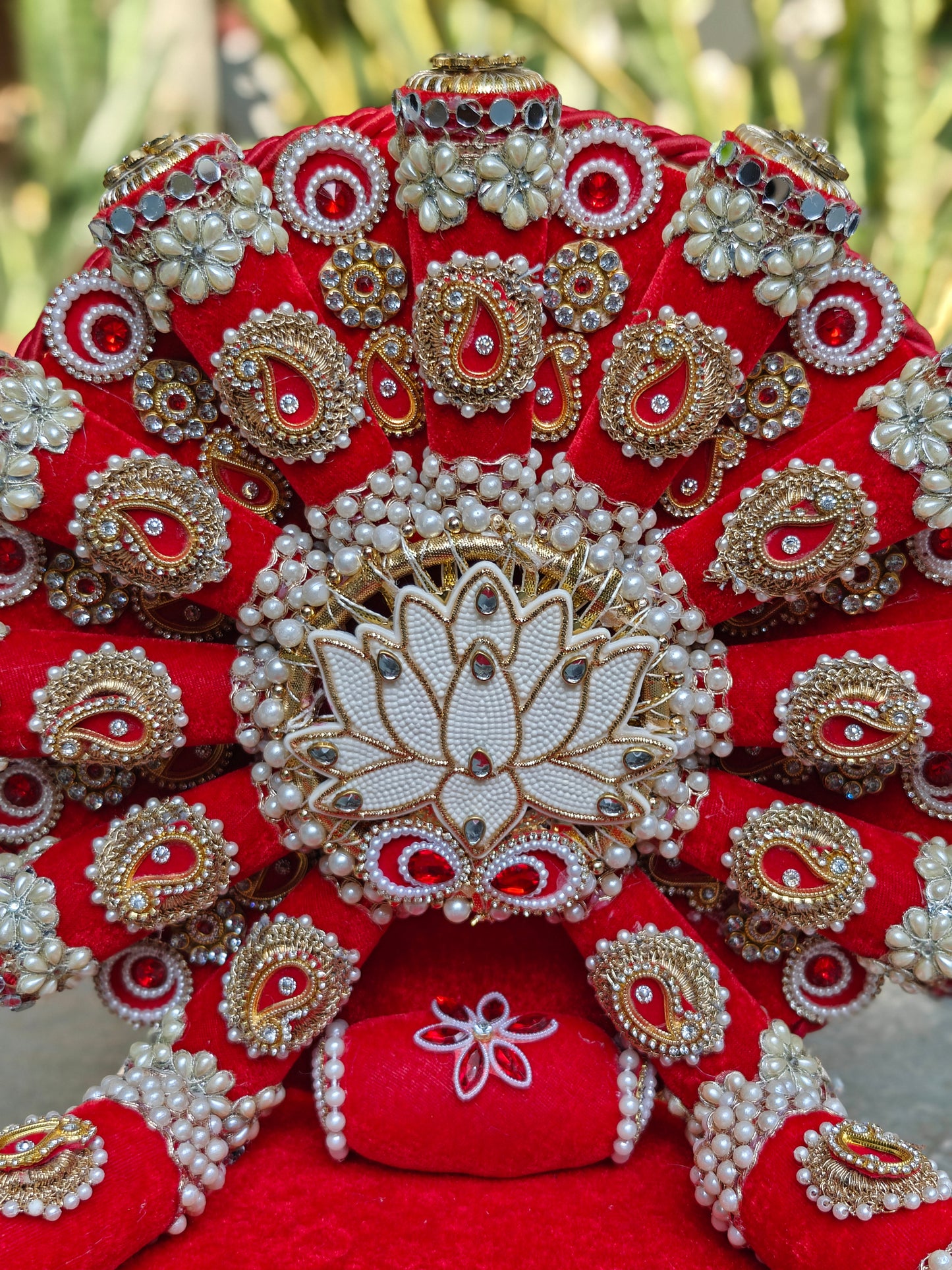 Royal Collection handcrafted red velvet lotus singhasan for Ladoo Gopal – pearl and zardozi white lotus centrepiece, gold paisley embellishments, ruby stones, antique mirror work, double pearl border, detachable backdrop, 14 inch height, 12 inch MDF base – The Wedding Station