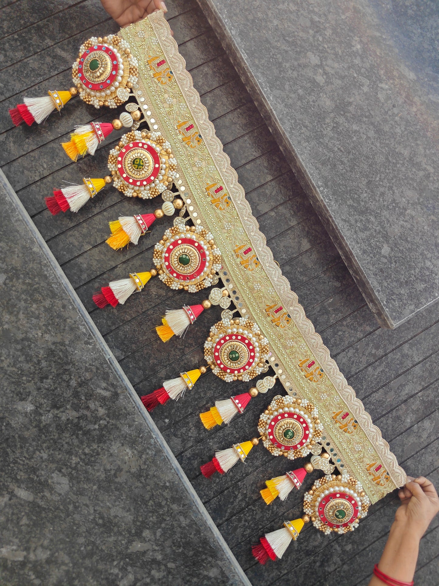 Bandhanwar with gold elephant motif embroidery and mirror border