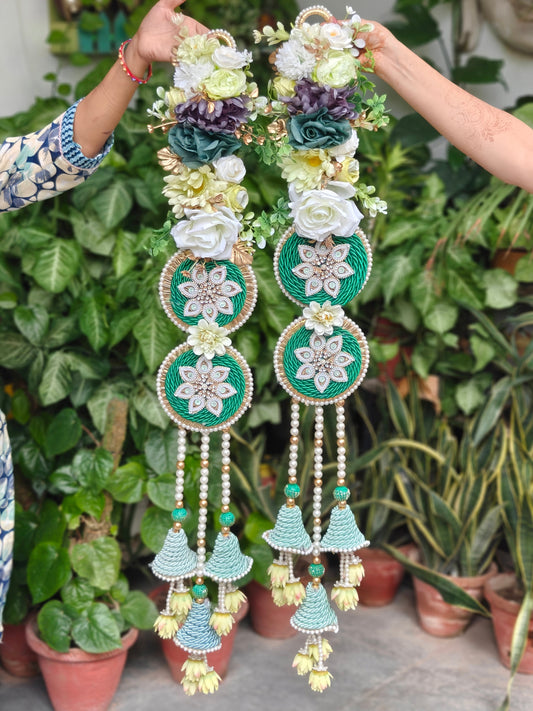 42-inch floral Diwali hanging with green embellished motifs, pearl detailing, pastel flowers and cascading tassels