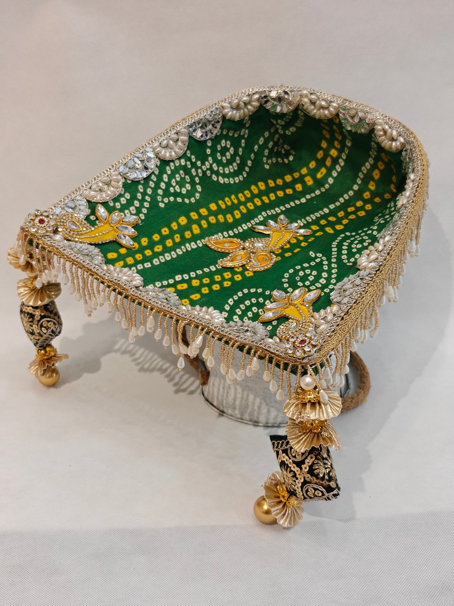 Green bandhani soupda with mirror scallop border, kundan motifs and pearl drop fringe — decorative wedding puja tray 8x7 inch