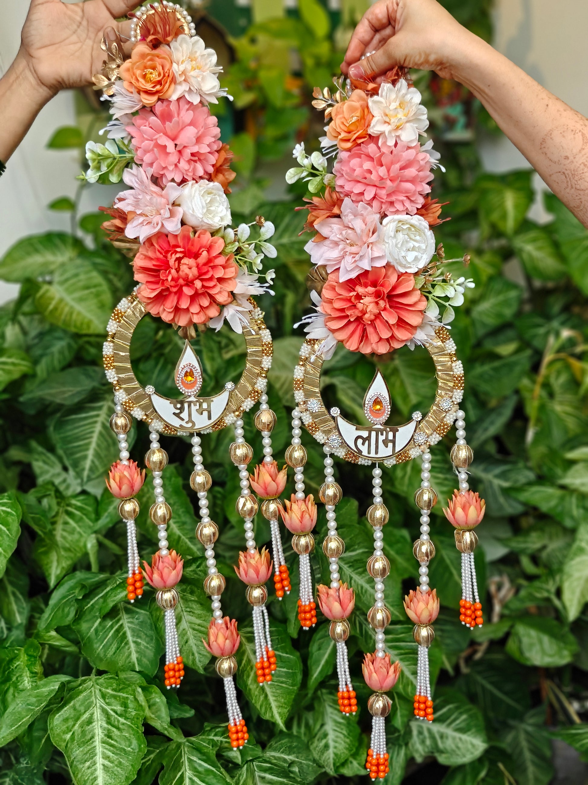Shubh Laabh Diwali hanging with floral arrangement, diya motif, pearl strands, golden beads and lotus-shaped tassels