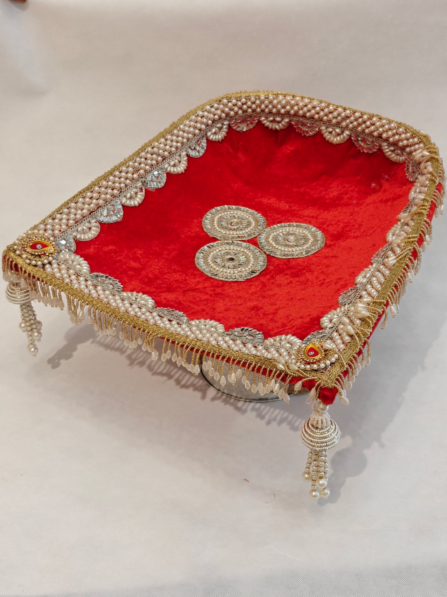 Large Soupda 12x13 inch with red velvet interior, layered pearl string border, gold zardozi medallion and cascading pearl bead fringes — handcrafted wedding puja tray by The Wedding Station