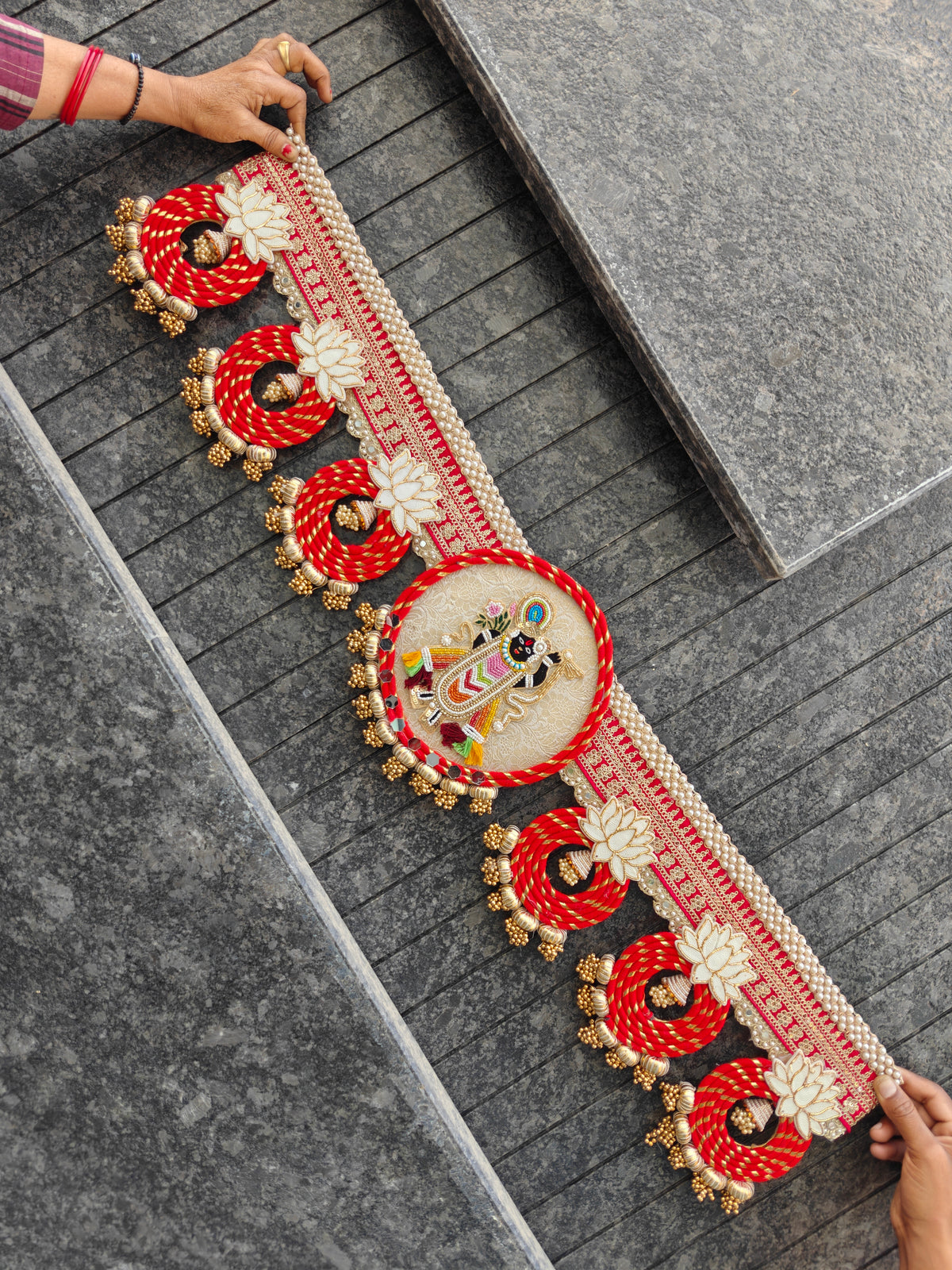 Beaded Shrinathji Krishna figure on devotional Bandhanwar