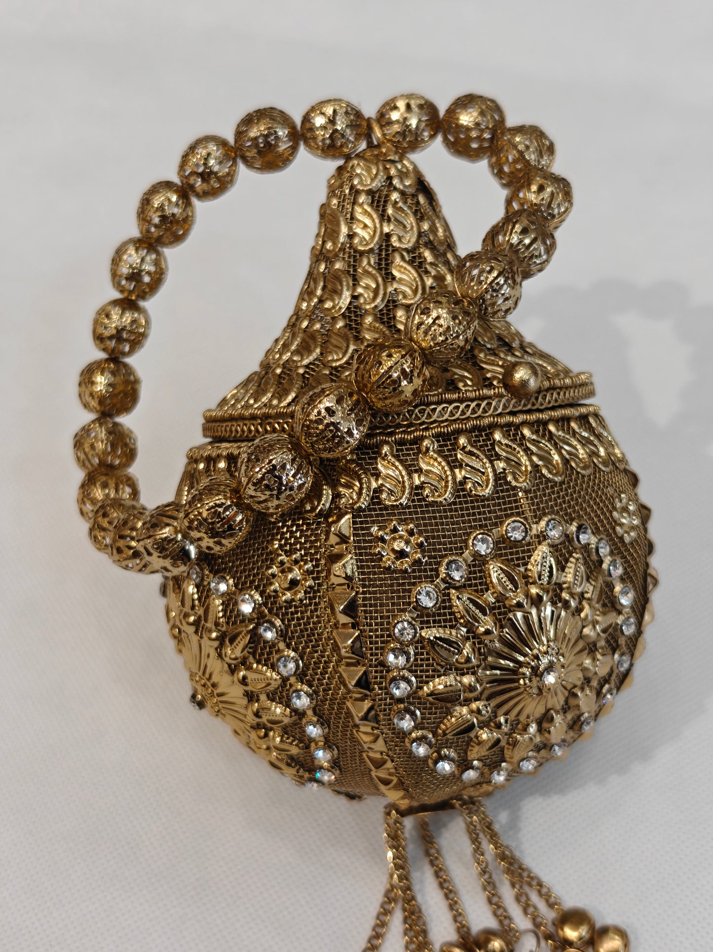 Handcrafted Gold Brass Potli Bag | Bridal Potli with Crystal Rhinestones, Paisley Motifs, Ghungroo Chain Tassels & Bead Handle | Wedding & Festive Accessory