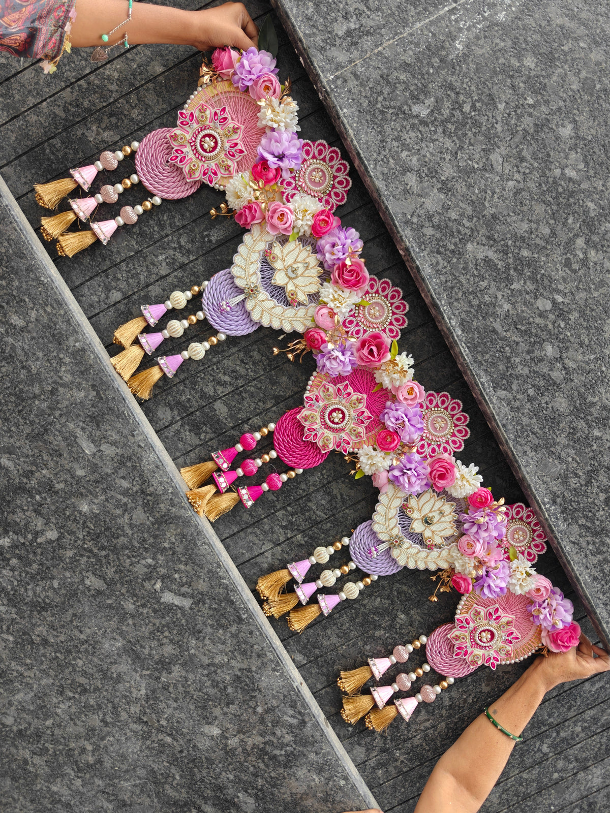 Pink and lavender floral toran with roses, pearl lotus medallions, thread-work mandalas and gold tassels