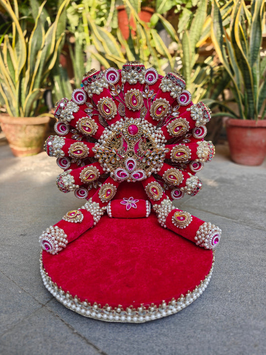 Royal Collection handcrafted rani pink velvet singhasan for Ladoo Gopal – antique gold Kundan polki centrepiece with fuchsia cabochon, zardozi paisley embellishments, mirror roundels, marquise crystals, double pearl border and detachable backdrop – The Wedding Station