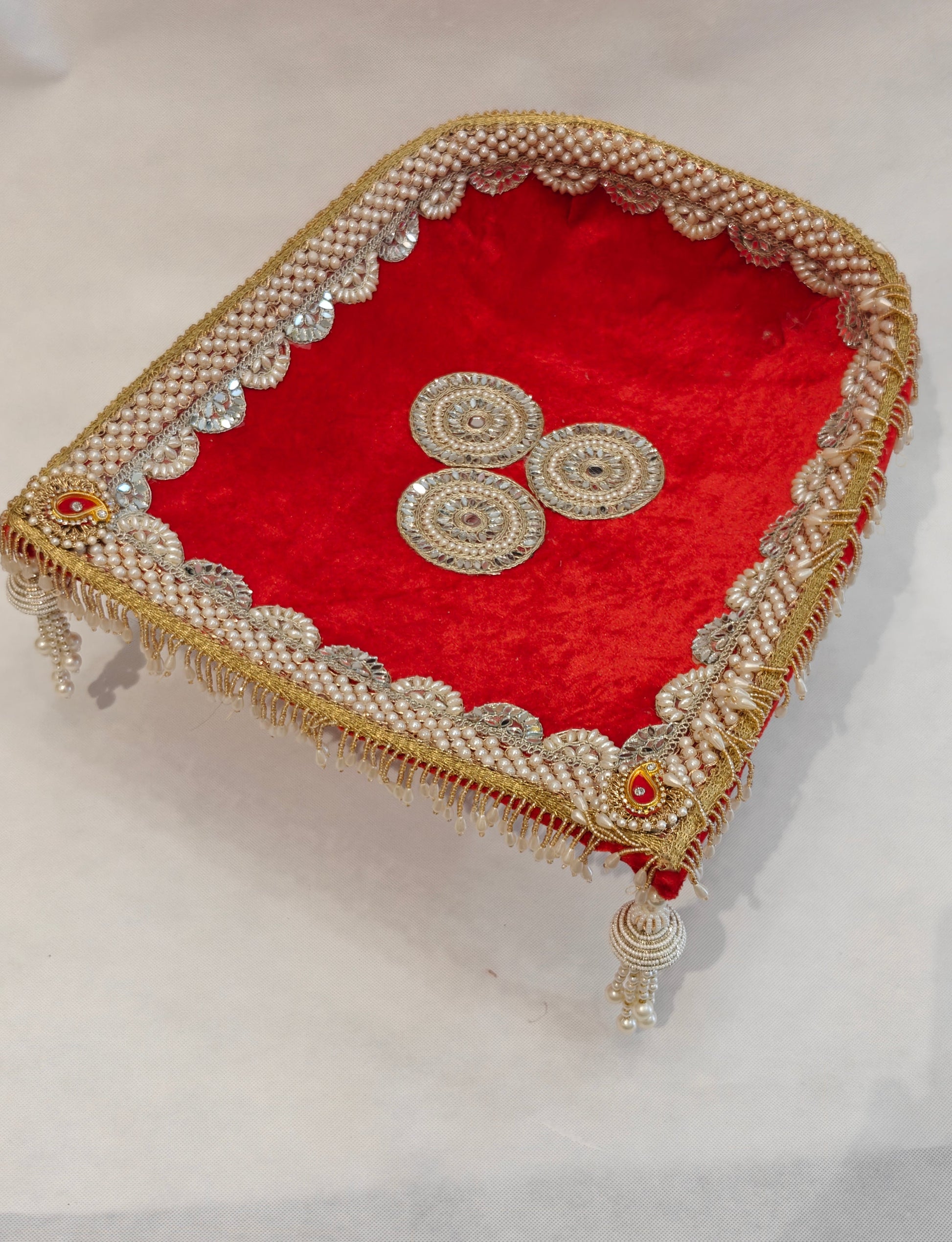 Large Soupda 12x13 inch with red velvet interior, layered pearl string border, gold zardozi medallion and cascading pearl bead fringes — handcrafted wedding puja tray by The Wedding Station